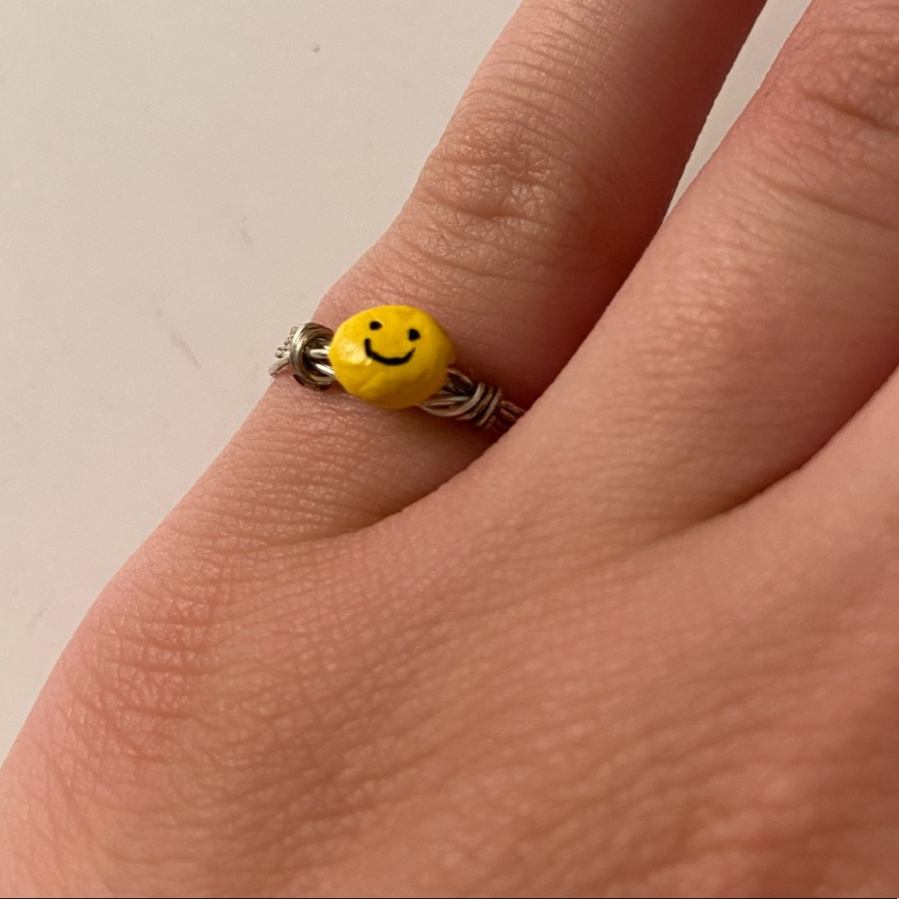 Etsy handmade wire ring with smiley bead charm